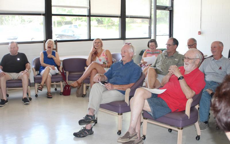 Megan Broome/The Clayton Tribune. A crowd of people from the community gathers at an informational forum for aspiring candidates and listens to potential candidates running for city council seats in Clayton and Dillard on August 16 in Clayton.