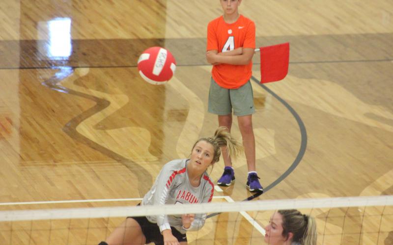 Rabun County’s Lexi Crump spikes the ball during a match against Lumpkin County at Ken Byrd Court at Rabun County High School in Tiger on Tuesday night. The match was the first of three matches featuring Rabun County, Lumpkin County and Stephens County. (Glendon Poe/The Clayton Tribune)