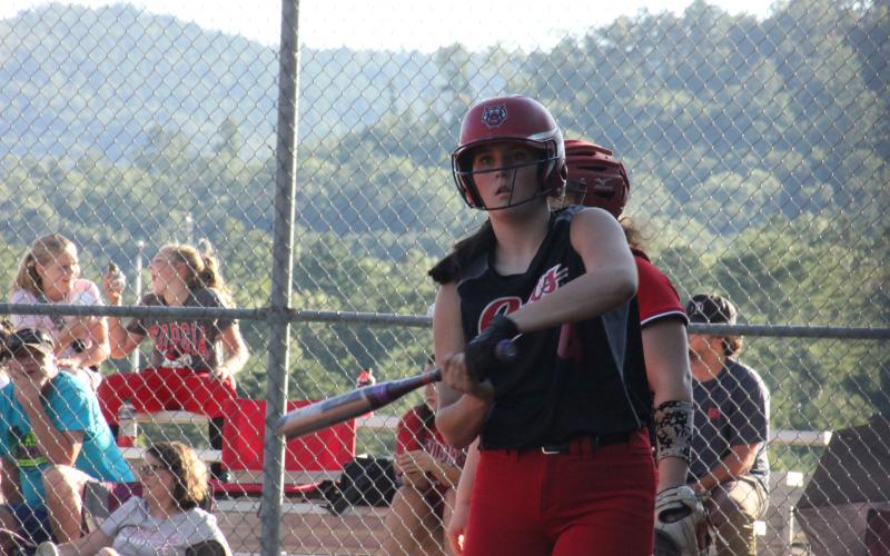 Rabun County’s Mary Lovell gets instructions from coach Angela Shepheard during an at-bat against Social Circle at Rabun County High School in Tiger last Thursday. (Glendon Poe/The Clayton Tribune)