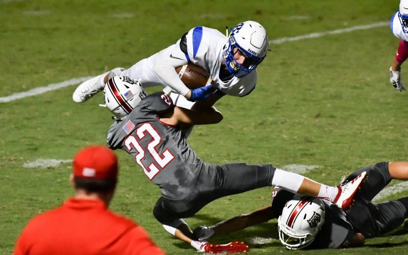 Rabun County cornerback Hunter Moore (22) tackles a Banks County ballcarrier at Frank Snyder Memorial Stadium in Tiger on Oct. 4. (Scott Poss/Special to The Tribune)