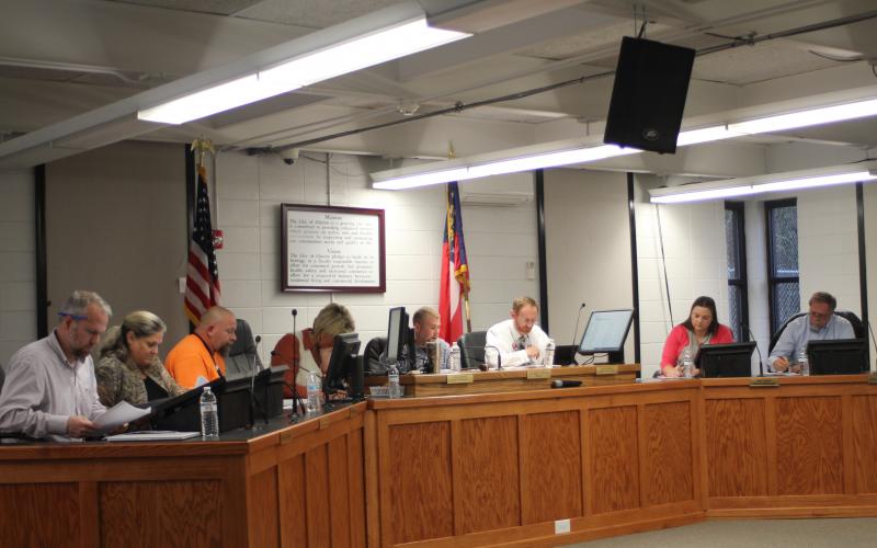 Megan Broome/The Clayton Tribune. The newly-elected Clayton City Council holds their first meeting of 2020 at the Clayton Municipal Complex on Tuesday. From left, Woody Blalock, Michelle Duquette, David Cross, Cissy Henry, city manager, Jordan Green, mayor, Mitch Baker, city attorney, Ara Joyce and John Bradshaw.
