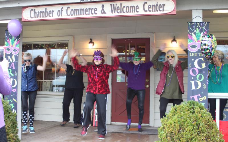 File photo Revelers take part in last year’s Mardi Gras event at the Welcome Center.