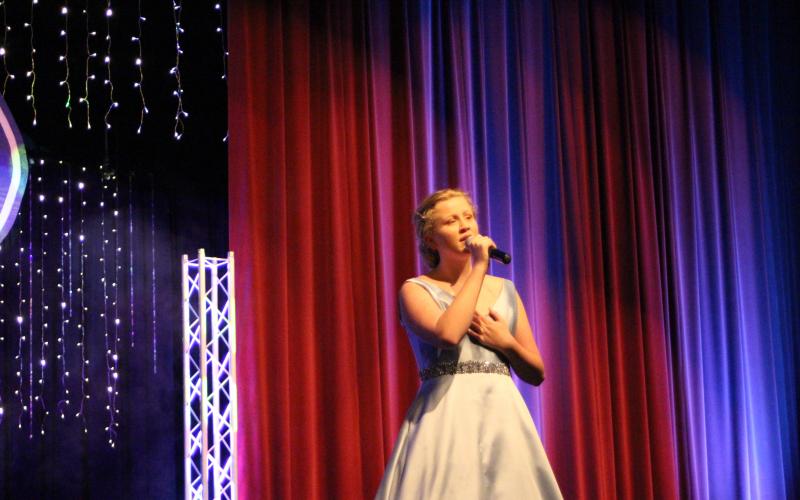 Megan Broome/The Clayton Tribune. Hailey Smith sings the song “My Heart Will Go On” for her judges’ choice solo performance.