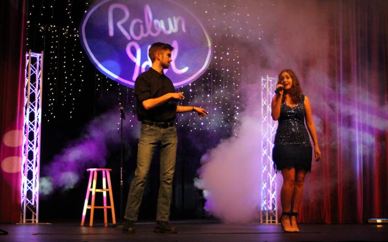 Megan Broome/The Clayton Tribune. Garrison Matlock, left, and Taylor Erlewine sing a duet of the song “Don’t Go Breaking My Heart” at the final Rabun Idol performance on Friday, Feb. 28 in the Fine Arts Building at Rabun County High School