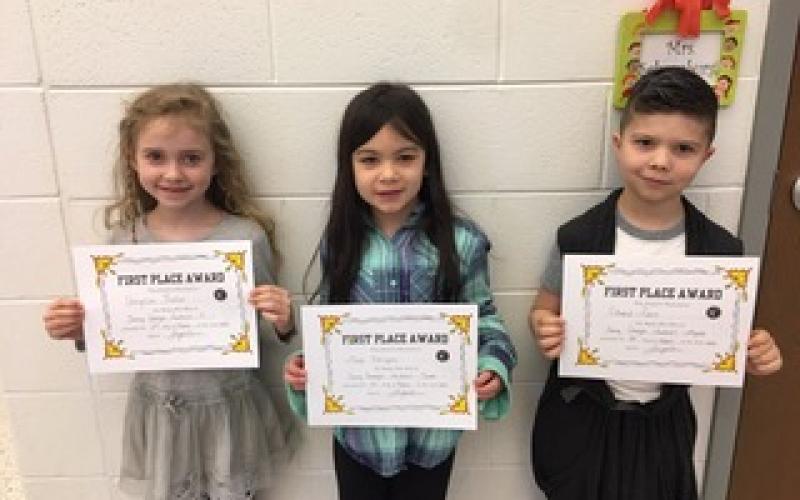 RCPS student winners for the Young Georgia Authors are pictured from left: Cryslin Fisher (Kindergarten-Mrs. Judy), Maya Rodriguez (1st Grade-Mrs. Kelly) and Edward Lewis (2nd Grade-Mrs. Stockton). 