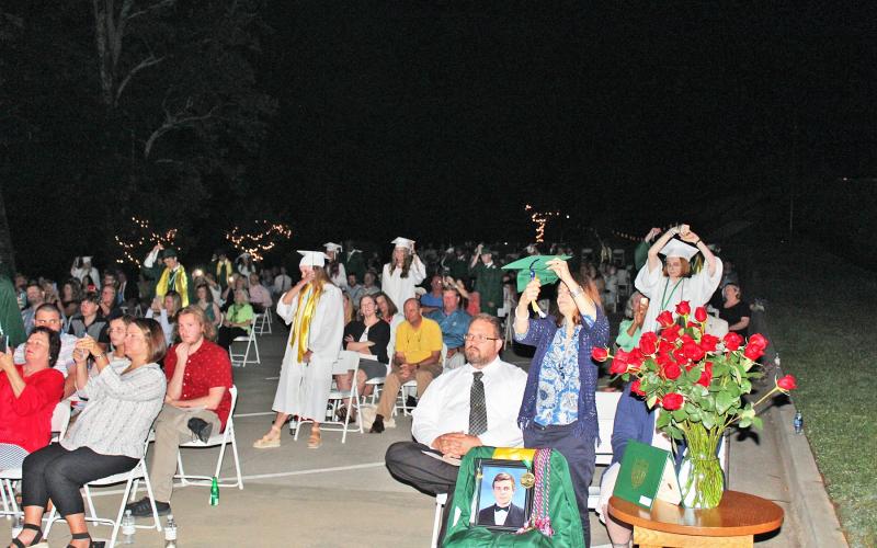 Isaiah Smith/CNI Regional News. An empty chair at graduation ceremonies for Tallulah Falls School Friday marked the loss of Class of 2020 member Stephen Bowman, who died in a drowning accident June 13. 
