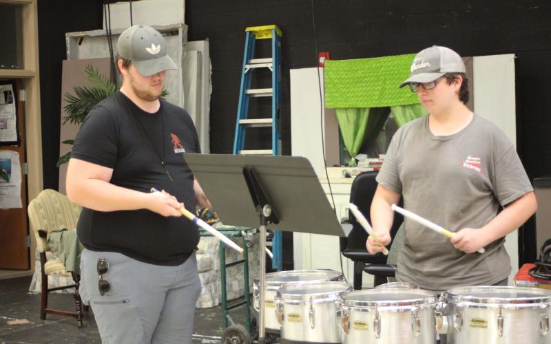 Percussion Instructor Isaac Oakes helps Sean King during percussion sectionals at band camp at Rabun County High School last week. 