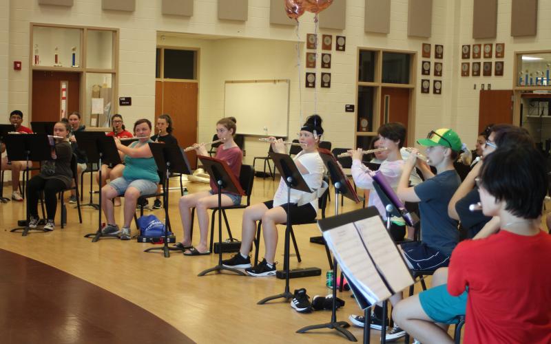 Amy Henderson, left, Ivy Duttenhoffer, Cheyenne Bradshaw, Jazmin Forrester, Audrey Schomberg, McKenzie Hamilton, Elena Ellis and Asia Tran-Cao practice during woodwind sectionals in the Rabun County High School band room at band camp. 