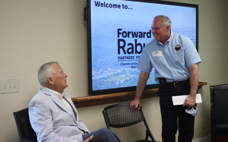 Megan Broome/The Clayton Tribune. Former Gov. Nathan Deal (left) is greeted by Forward Rabun Director Rick Story Tuesday at the organization's inaugural board meeting. Story previously worked for Deal during his time as Georgia governor. 