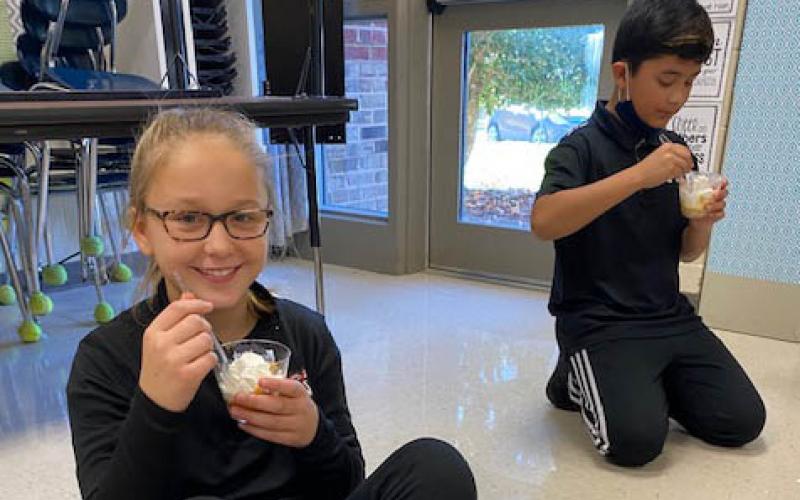 Photo courtesy Rabun County Schools. Cristina Weber’s 5th grade science class students are learning about mixtures and solutions. They made a thanksgiving favorite, pumpkin pie(in a bag), and made observations about states of matter, mixtures and solutions.