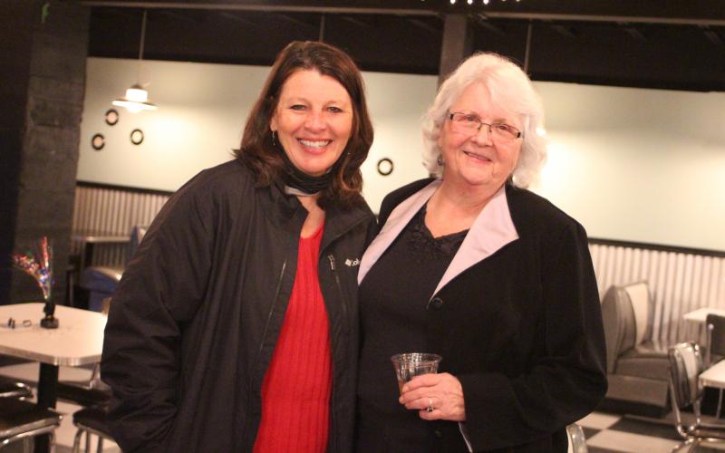 Megan Broome/The Clayton Tribune. Melody Henderson, Chamber of Commerce board secretary, left, and Juanita Shope attend a reception honoring Shope last Thursday at The Diner below the Rabun County Civic Center. Shope recently stepped down as president and community liaison of the Rabun County Chamber of Commerce.