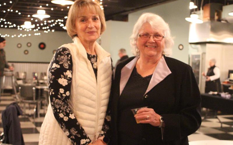 Megan Broome/The Clayton Tribune. Rhonda Vinson, left, and Juanita Shope attend a reception honoring Shope last Thursday at The Diner below the Rabun County Civic Center. Shope recently stepped down as president and community liaison of the Rabun County Chamber of Commerce.