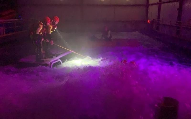 Submitted photo. A group of Rabun County Search and Rescue crew members attend Swiftwater Rescue Training at the Fathom Academy in Georgetown, Texas in 2019. The group trains in a night ops simulation. 