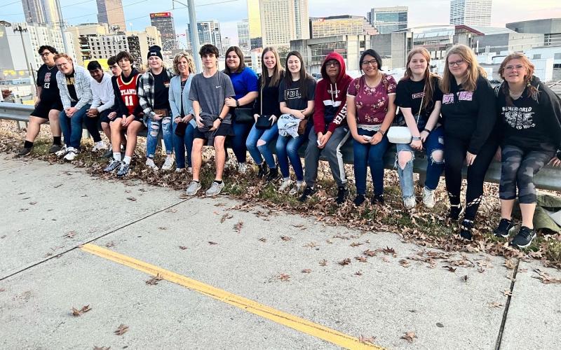 Submitted photo. FBLA Hawks Night at State Farm Arena (from left) -- Lucas Stewart, Carson Carpenter, Om Patel, Robbie Fountain, Andy Nolan, Kaitlyn Swager, Ms. Allison Watts, Hayden Speed, Bailey Shriver, Samantha Salter, Anna Grace Thompson, Ethan Avendano, Joselyn Gaspar, Riley Abel, Victoria Richardson and Madison Ramey.  