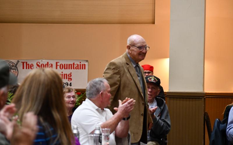 Megan Broome/The Clayton Tribune. Ninety-seven-year-old Navy WWII veteran C.A. Henson is recognized as the oldest veteran at the Veterans Appreciation Dinner.