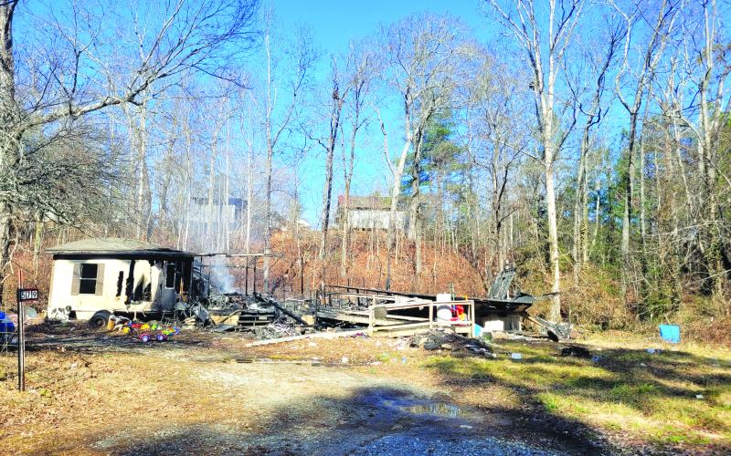 Megan Broome/The Clayton Tribune. The cause of the fire at 579 Connector Road off Camp Creek Road in Wiley remains under investigation by the State Fire Marshal’s Office. 