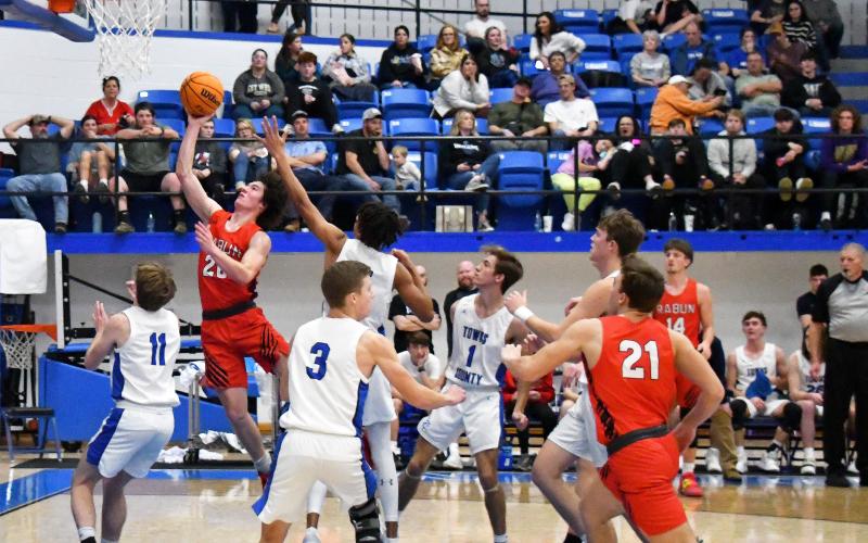 Luke Morey/The Clayton Tribune. Senior Jayton Henry goes up for a layup against Towns County in the semifinals on Thursday, Dec. 29. Henry posted 22 points to help the Wildcats to the championship game where they won 54-53. Henry was named to the All-Tournament team. 
