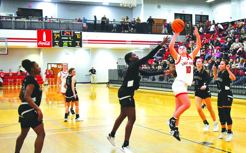 Luke Morey/The Clayton Tribune. RCHS junior Mili Watts goes up for a layup against Tallulah Falls on Friday, Feb. 10. Watts ended with 14 points, including 10 in the first quarter, to help the Lady Cats to a  72-62 victory. Watts also added three steals and four rebounds as the primary defender on Tallulah Falls’ best player Denika Lightbourne. 