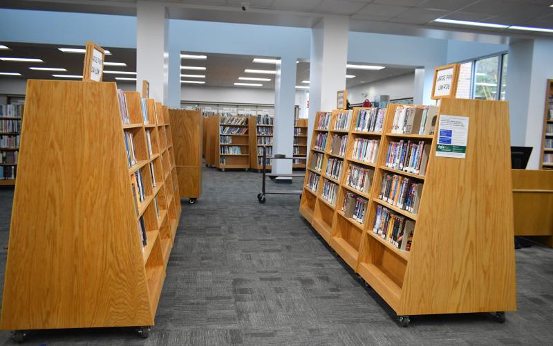 Megan Broome/The Clayton Tribune. The Rabun County Public Library was revamped during its closure and the large print books were reorganized and moved closer to the front of the library for easier access. 