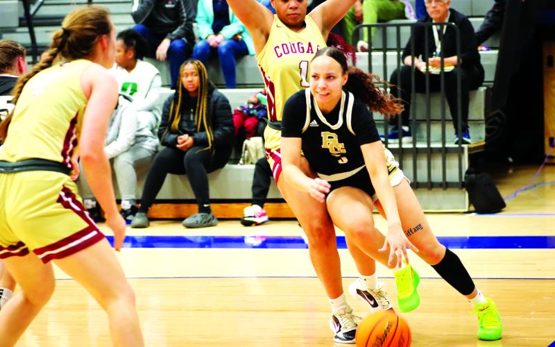 RGNS Athletics. Rabun Gap senior Mia Wilson drives against Cannon School on Saturday, Feb. 25. Wilson put up 16 points to help the Lady Eagles win their second straight state championship. 