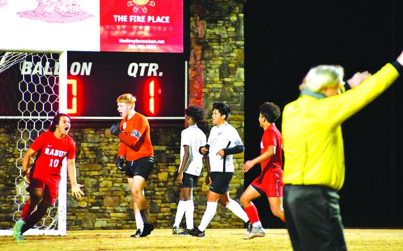 Luke Morey/The Clayton Tribune. Rabun County’s Luis Lopez (10) celebrates a goal against Hart County.