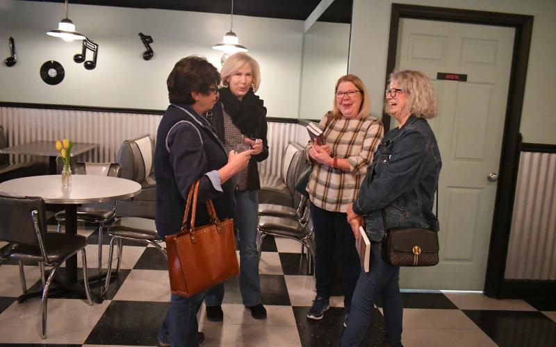 Megan Broome/The Clayton Tribune. Annette Brannen, Joanne Baumgartner, Gloria Stokes, and Jackie Baumgartner attend the book launch event for the release of "The Foxfire Book of Appalachian Women'