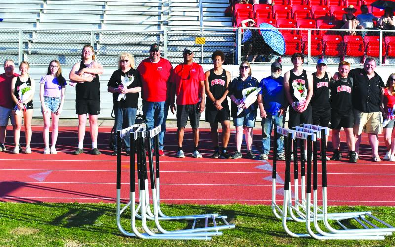 Luke Morey/The Clayton Tribune. The Rabun County track and field team honored their seniors in the last home meet of the season on Wednesday, April 19. The seniors include, from left, Molly Jo Wright, Delaney Webb, Kiley Turner, Mike Swager, Britt McKissack, Jayton Henry, Jet Galbreath, Sam Flaherty, Trea Blalock and Caroline Bahin. The track and field team now travels to Elberton for regionals on Wednesday, April 26, and Friday, April 28.