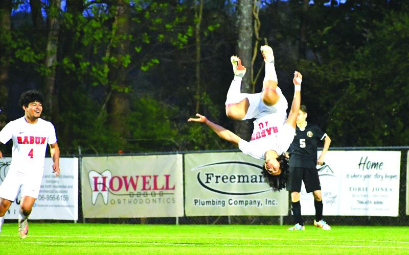 Luke Morey/The Clayton Tribune. Rabun County Wildcat junior Luis Lopez flips in celebration of his third goal against Commerce on Thursday, March 30. The No. 4 seed Wildcats will travel to take on Dalton Academy on Wednesday, April 12.  
