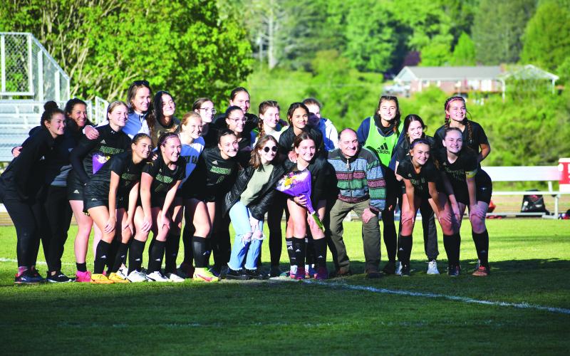Luke Morey/The Clayton Tribune. The Rabun Gap girls soccer team poses with their three seniors, Ella Dow, Caroline Bonomo and Catherine Childs. The Lady Eagles fell 1-0 in the second round of the NCISAA state playoffs. 