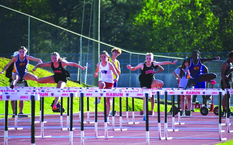 Luke Morey/The Clayton Tribune. Seniors Delaney Webb (left) and Kiley Turner both earned a spot at the state sectionals meet in the 100-meter hurdles during the region tournament at Elbert County on April 25-28. Turner captured first place as region champion, with Webb finishing in third place.