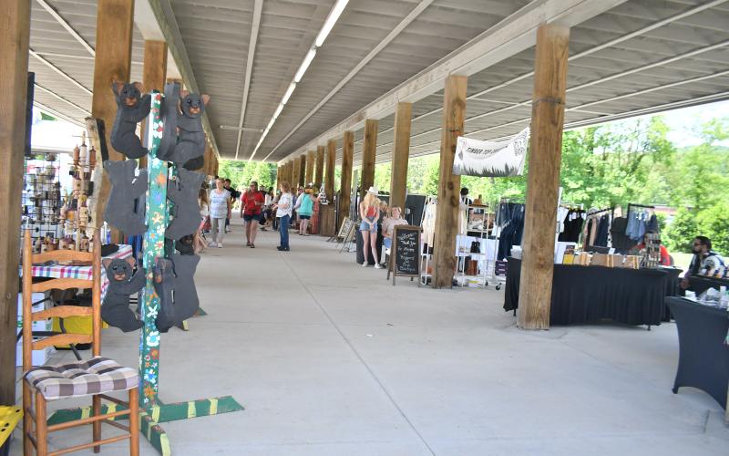 Megan Broome/The Clayton Tribune. Over 100 artisans with their handmade crafts were featured at the second annual Of These Mountains Spring MarketPlace in Clayton Saturday, May 13. Crowds of people showed out to enjoy the community event featuring unique creations. 