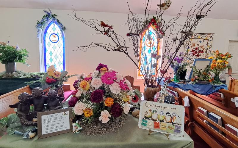 Megan Broome/The Clayton Tribune. This display themed "Birds" was arranged beautifully at the St. James Episcopal Church Flower and Liturgical Arts Festival.