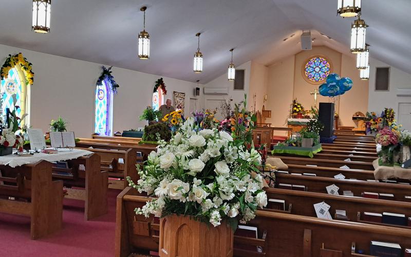 Megan Broome/The Clayton Tribune. St. James Episcopal Church was decorated with beautiful flowers and floral displays for the 15th Annual Flower and Liturgical Festival.