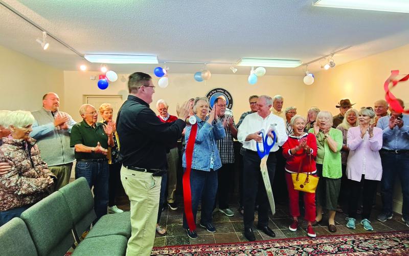 Megan Broome/The Clayton Tribune. City of Sky Valley officials, community members and Forward Rabun/Rabun County Chamber of Commerce cut the ribbon on the new location for Sky Valley City Hall Friday, May 26. 