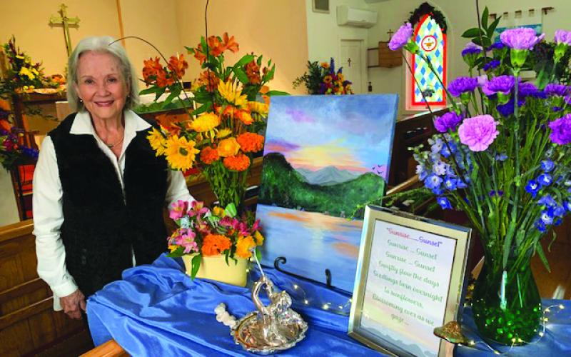 Photo courtesy Tim McCabe. Sharyn McCabe’s original acrylic painting entitled, “Trey Mountain” is featured in her exhibit, “Sunrise, Sunset” at the opening of the flower show.
