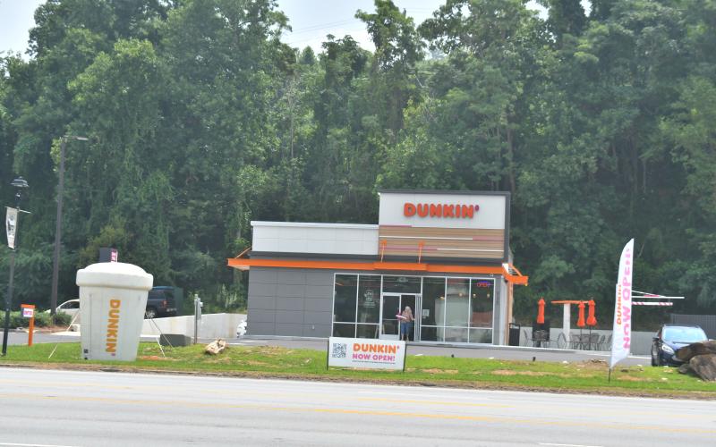 Megan Broome/The Clayton Tribune. Since Dunkin' Donuts opened in Clayton Thursday, July 13 customers have glazed the business. 