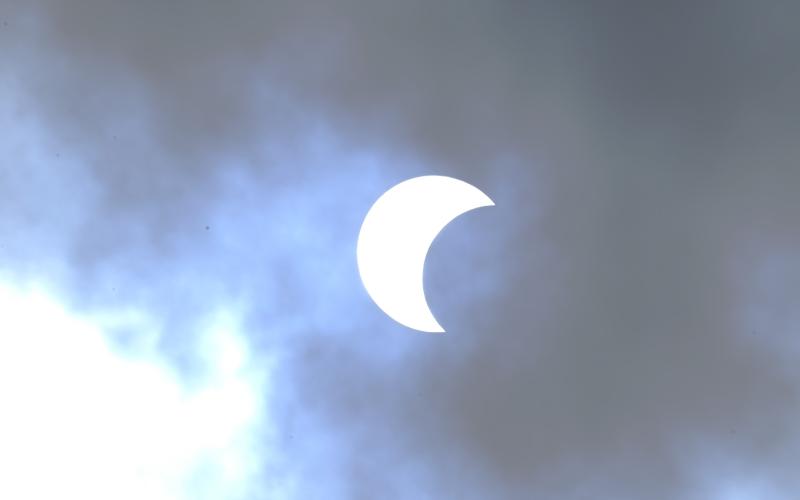 Photo courtesy Truett Spivey. The sun seems to have a slice taken out of it during the Oct. 14 solar eclipse.