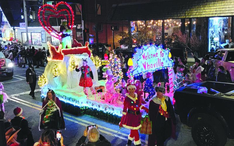 Enoch Autry/The Clayton Tribune. In the “Best Float” category at the Dec. 8 Clayton Christmas Parade, the winner was Rebel Custom Paint with its lighted “Welcome to Whoville” float. 