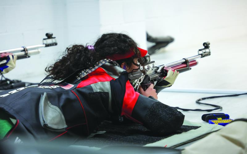 TFS Athletics. Brianna Walter prepares to shoot her rifle. Walter fared well in a qualifying event for Women’s Air Rifle Olympic Team.