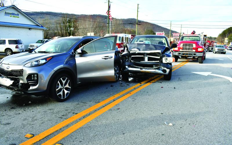 Megan Horn/The Clayton Tribune. Two of the vehicles involved in a five-vehicle crash on Dec. 21 remained in the middle of Highway 441 on Dec. 21 as first responders worked the scene. Minor injuries were reported and a Rabun County man was arrested following the crash. 
