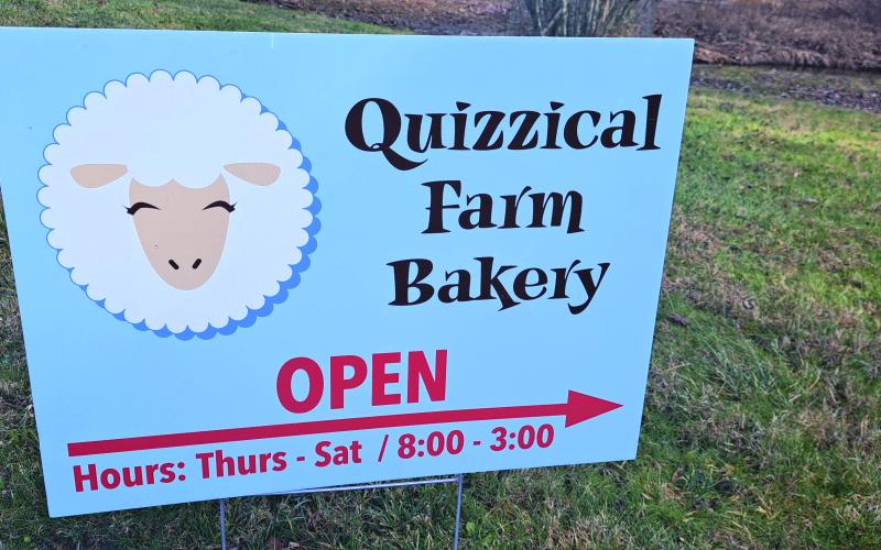 Megan Horn/The Clayton Tribune. The sign to the business points the way to Quizzical Farm Bakery on Patterson Gap Road.