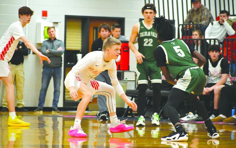 Wade Cheek/The Clayton Tribune. RCHS hoops freshman Landan Bedingfield guards the perimeter during a Feb. 9 matchup between the Wildcats and the Tallulah Falls School Indians. The 72-57 victory gave RCHS a top-spot in the region, tied with Athens Christian. 