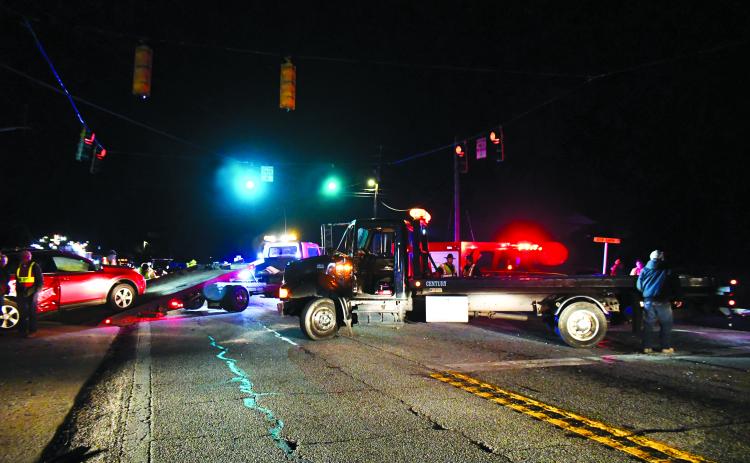 Megan Broome/The Clayton Tribune. Rabun County first responders work the scene of a two-vehicle crash on Georgia 15 at the intersection of Highway 246 in Dillard on Dec. 1. One motorist was charged following the crash.