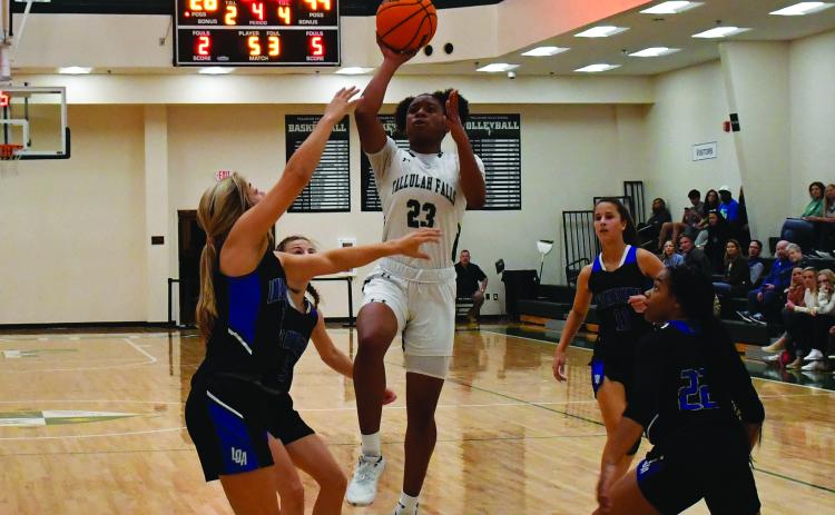 Luke Morey/The Clayton Tribune. Denika Lightbourne goes up for a shot against Lake Oconee Academy on Wednesday night. The Lady Indians are now on a four game losing streak.
