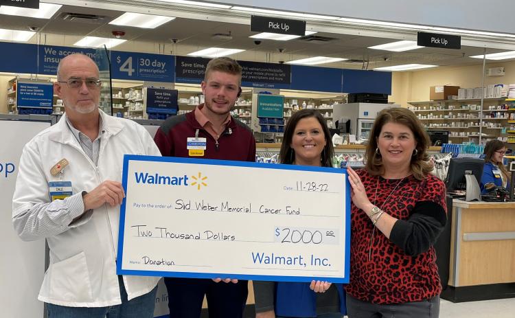 Submitted photo. Pictured are Dale Godwin, pharmacist, (left); Cameron Spivey, store manager; Whitney Upchurch, pharmacy technician; and Jennifer Arbitter, past president of Sid Weber Memorial Cancer Fund.