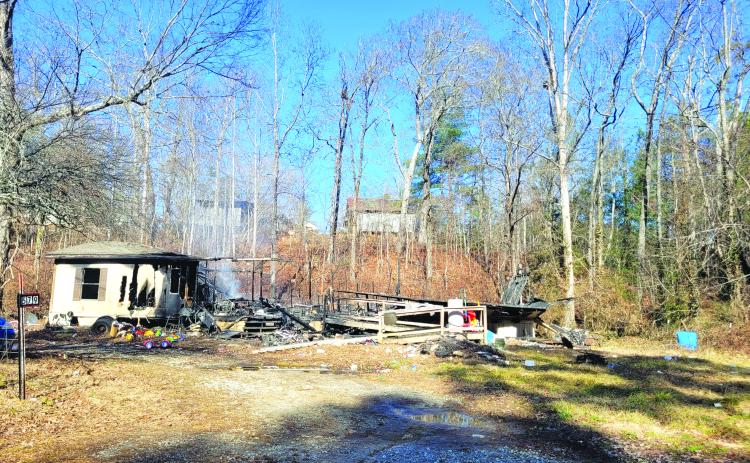 Megan Broome/The Clayton Tribune. The cause of the fire at 579 Connector Road off Camp Creek Road in Wiley remains under investigation by the State Fire Marshal’s Office. 