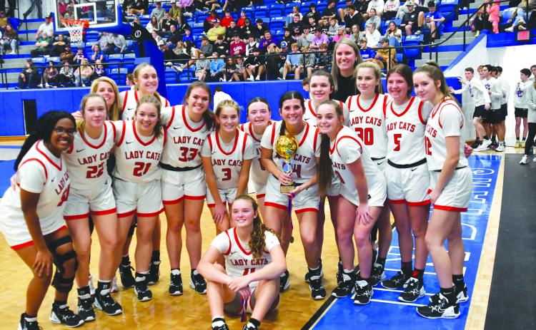 Enoch Autry/The Clayton Tribune. The Lady Cats claim the Battle of the States title with a 66-42 victory on Dec. 30 over Franklin (N.C.) High School.