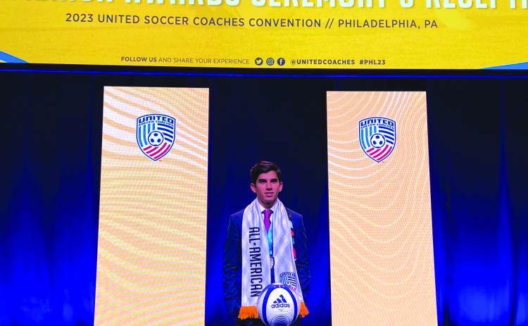 RGNS Athletics. Rabun Gap’s senior Emilio Roman poses during the All-American ceremony in Philadelphia during the United Soccer Coaches Awards Banquet on Saturday, Jan. 14. Roman helped lead the Eagles to back-to-back state titles on top of scoring 49 goals across the two years. 