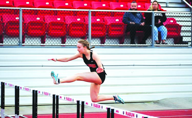 Luke Morey/The Clayton Tribune. Kiley Turner won both the 100 and 300 meter hurdles in the first track meet of the season. Turner helped the Lady Cats to a one point victory.