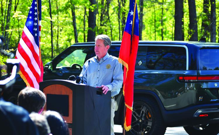 Luke Morey/The Clayton Tribune. Gov. Brian Kemp speaks at Tallulah Gorge State Park about a program that adds electric vehicle chargers Thursday, April 20.